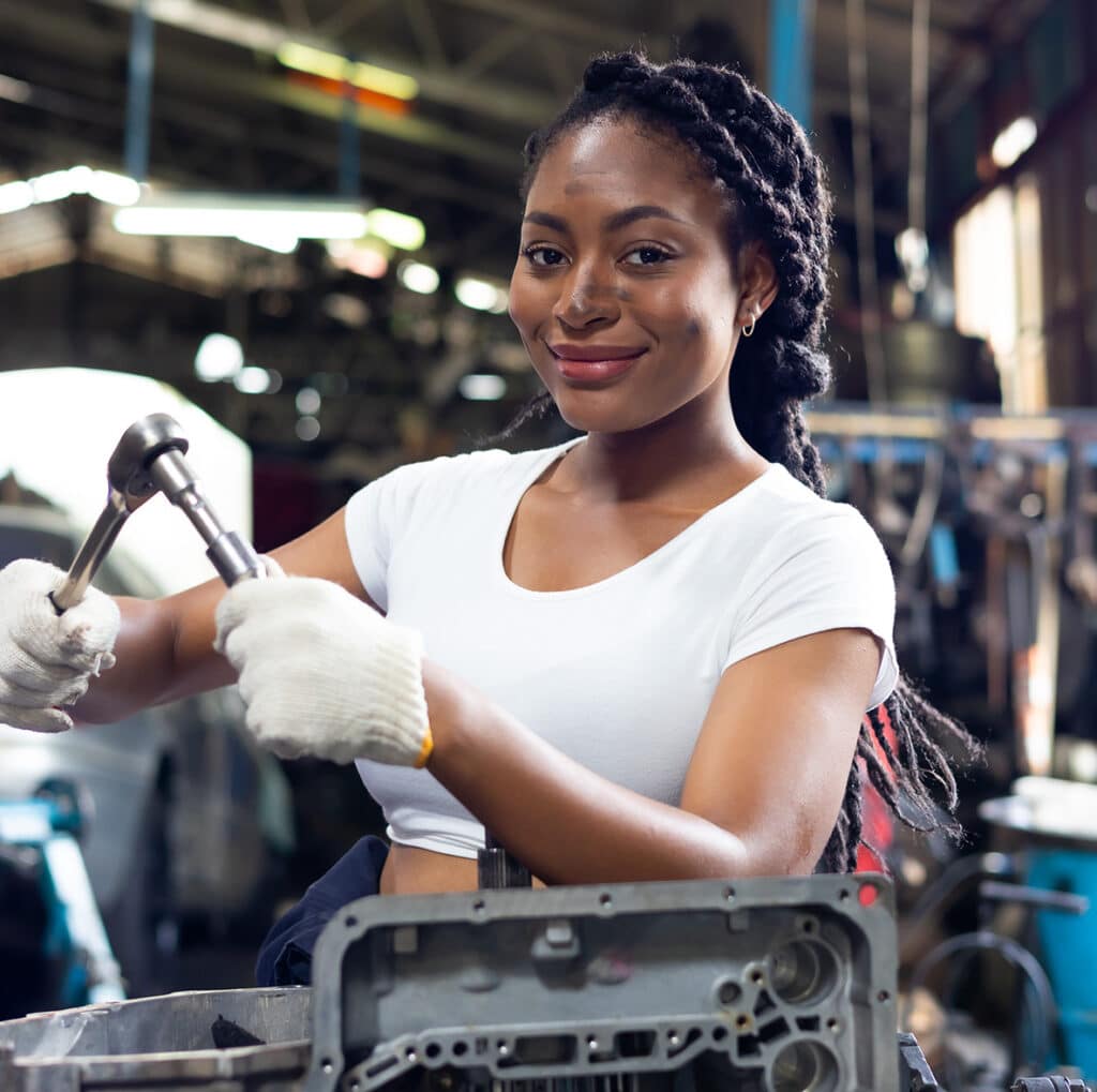 African american female in auto mechanic workshop